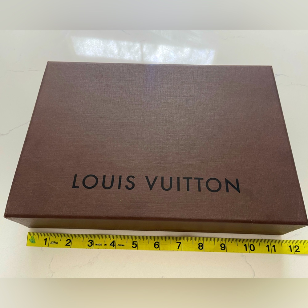 Large brown Louis Vuitton box. Minor scratches measuring 11 1/2 x 8